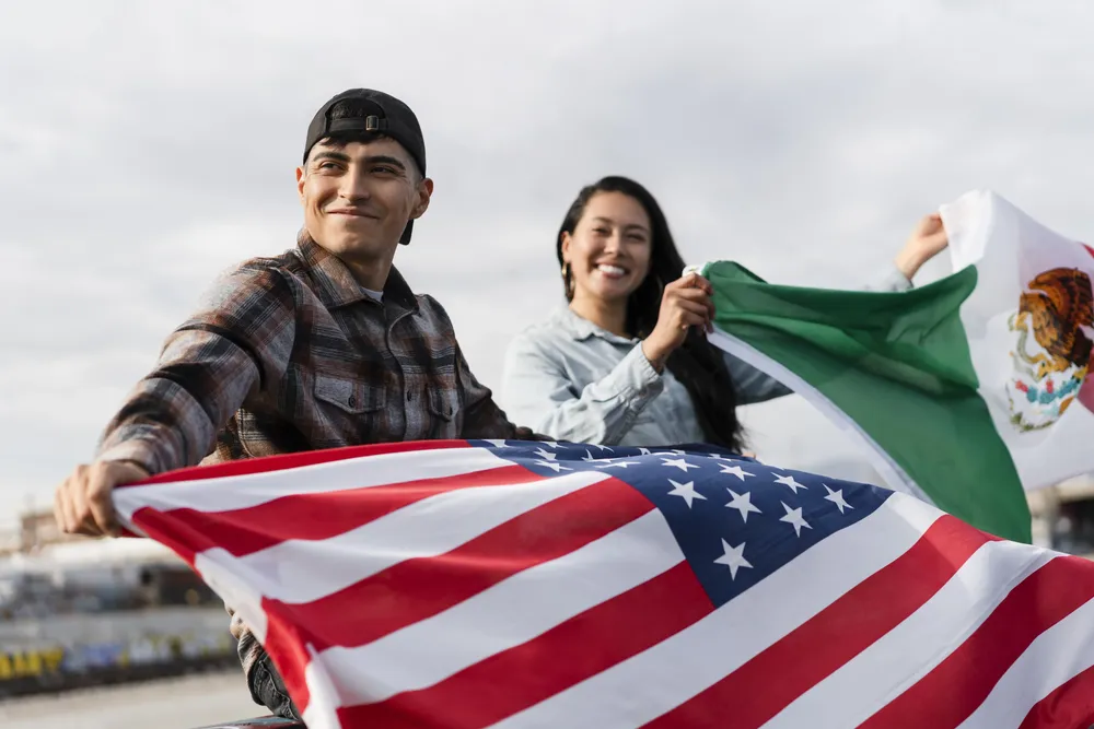 young-couple-with-flags-river